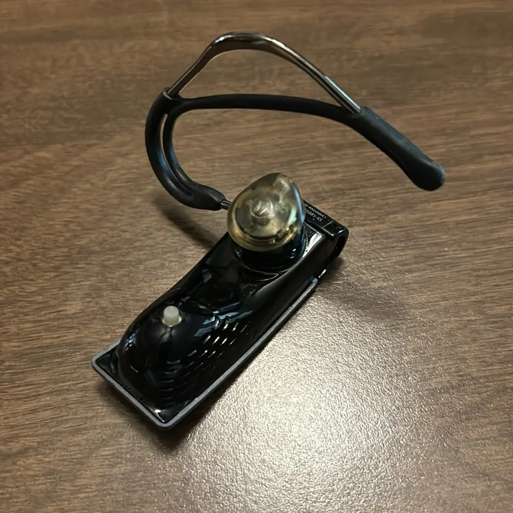 Jawbone Bluetooth earbud and charger